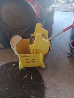 Mop bucket. In great condition. Comes with brand new mop. Asking $20.00