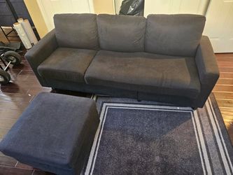 Dark Gray Sofa with Matching Ottoman — $120