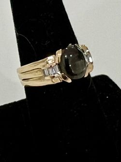 18KT Yellow Gold Black Star Sapphire & Diamond Ring