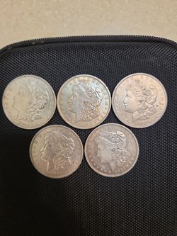 1921 Morgan Silver Dollars.  $60 each