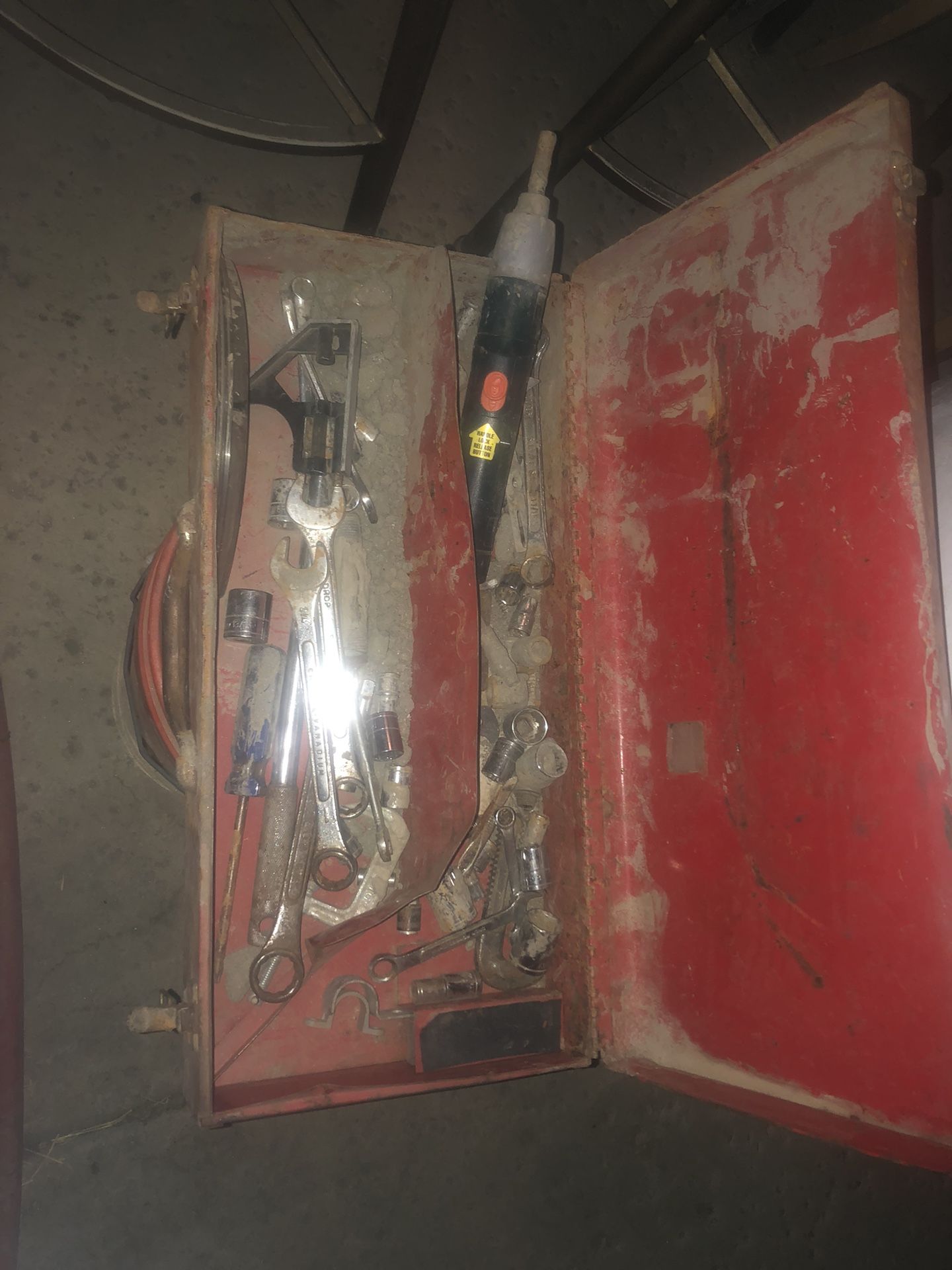 Tool chest with assorted tools inside
