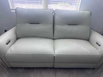 Leatherette power recliner- 3 seater excellent condition as new