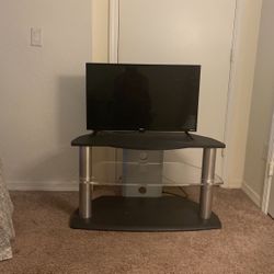 A Nice TV With A Nice Stand New