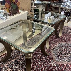 Pair of contemporary side tables & Console Table features a glass top supported by curved, metallic legs