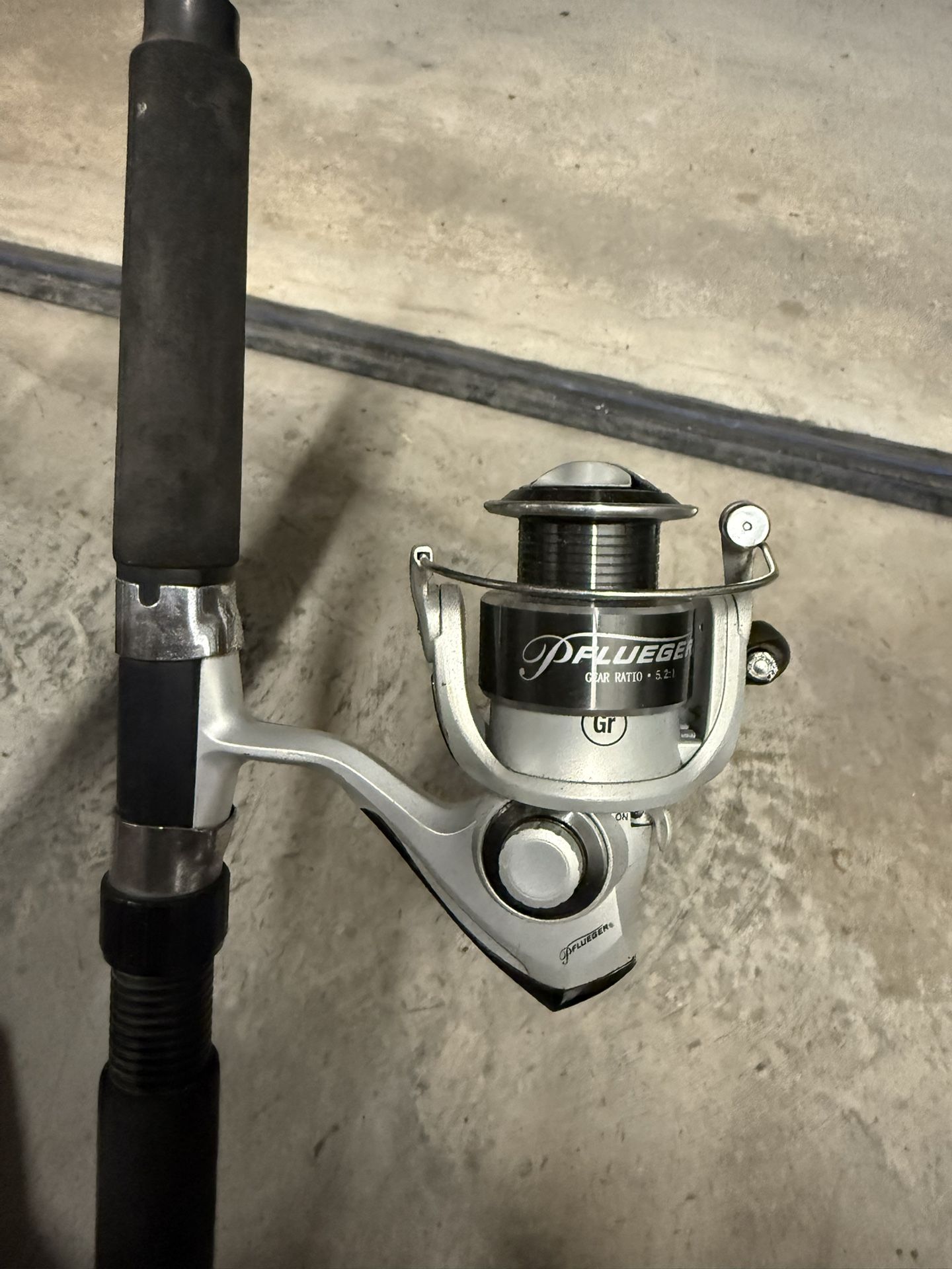 Pflueger Trion spinner on 7’2” rod #48