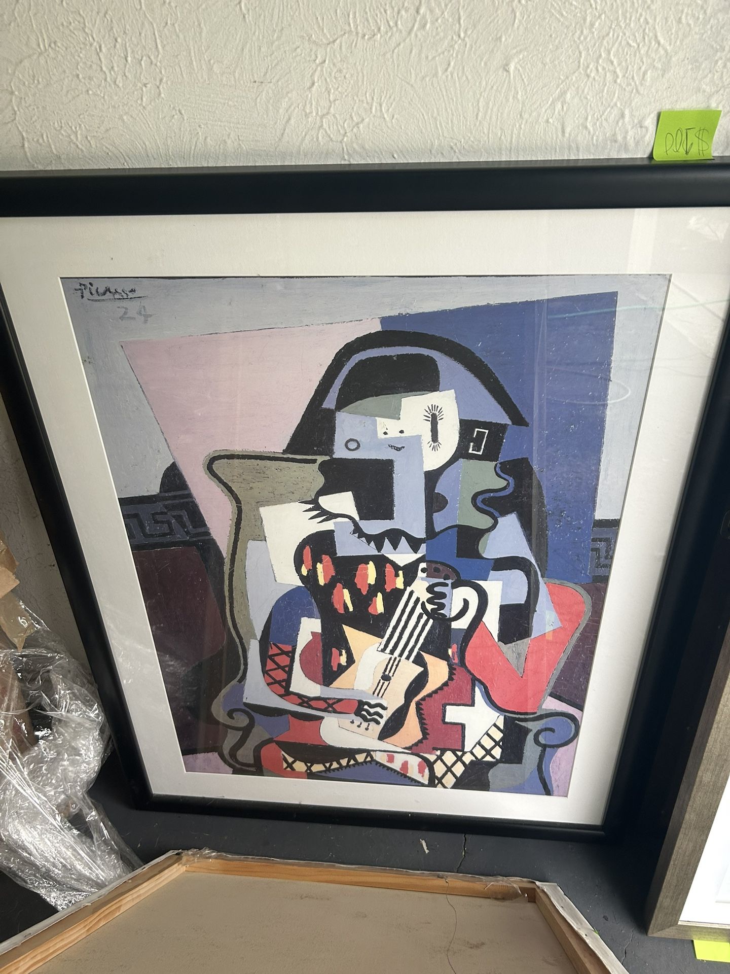 Harlequin Musician" by Pablo Picasso