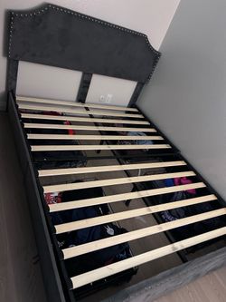 Queen sized Bed frame w/ storage underneath