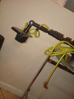 Solar panel brush cleaner