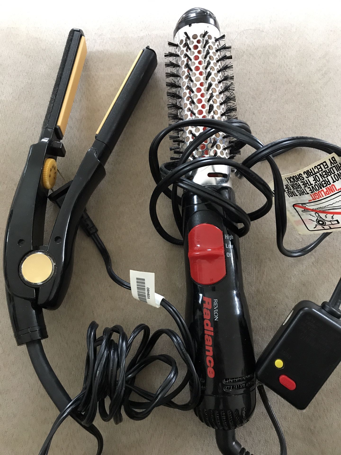 Hair straightener and curling brush