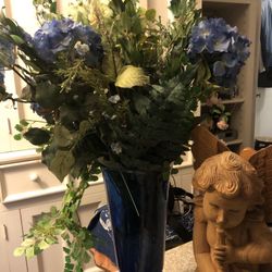 Blue Vase With Flowers