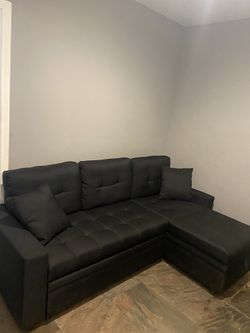 Black fabric pull out Sofa