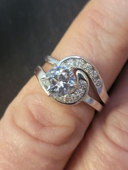 Beautiful Solid 925 Sterling Silver With Rodium Plating And 2 Ct. AAA Cubic Zirconia And Cubic Zirconians On Each Side. Size 5.