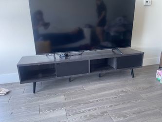TV and TV stand (can be sold separately)