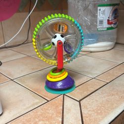 These Are Three Baby Toys, One For Reading One For Music And One For Playing