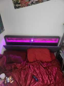 Bed frame with headboard