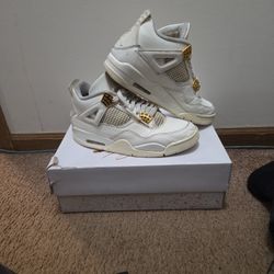 Metallic Gold Jordan 4s