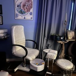 Pedicure Chair With White Leather Stool And Small White Magazine Table
