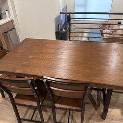 Wood Dining table with long bench seat and 4 chairs
