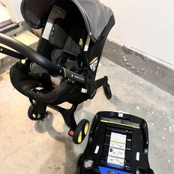 Doona Infant Car Seat & Stroller + Base – Excellent Condition