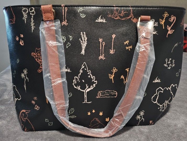 Winnie the Pooh bag/pañalera