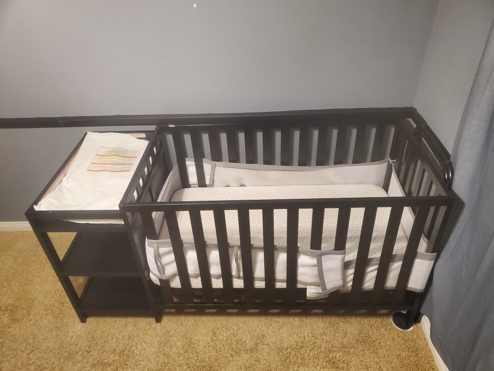 Black Wooden Crib With Attached Changing Table