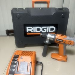 Ridgid 18V 3/8 Cordless Drill Model R84001 W/Charger & Case Only New Old Stock. New open box , drill charger and case only. Please note this is an ope