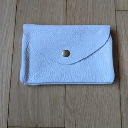 Fine Italian Soft Pebble Leather Coin & Credit Card Wallet 6"X4". White. 3 Compartments Zippered. Brass Hardware. Simple Elegance!

The softest thing 