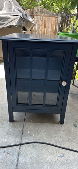 Dark blue glass front side table