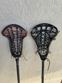 Two Female Lacrosse sticks 