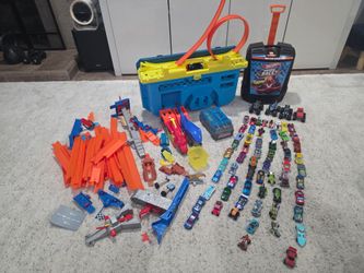 Multiple Hot Wheels Sets, Cars, and Carrying Case