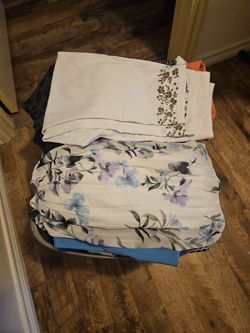 Basket full of beautiful clothes. All Kind, All Sizes. Must see to appreciate. $3 Each piece.