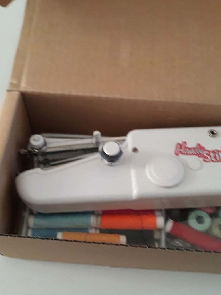 Hand Held Sewing machine