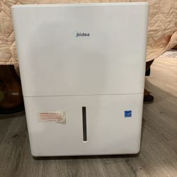 a Midea MAD2OC1ZWS Dehumidifier,