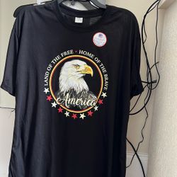 America Land Of The Free Home Of The Brave" black t-shirt. 