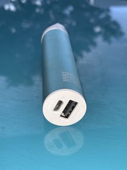 Portable cell phone charger