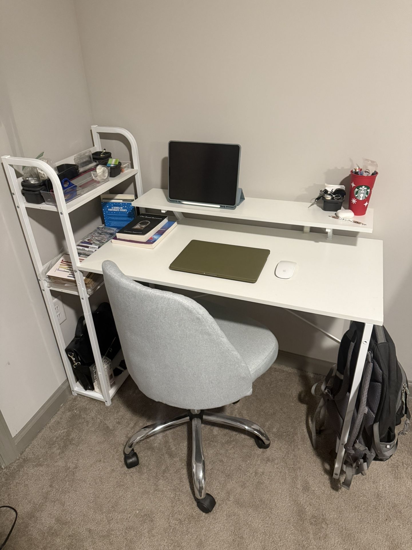 White desk w/ monitor stand & shelves + blue/gray armless swivel chair 
