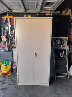 Metal cabinet 3 feet wide 6 feet high and 18 inches deep