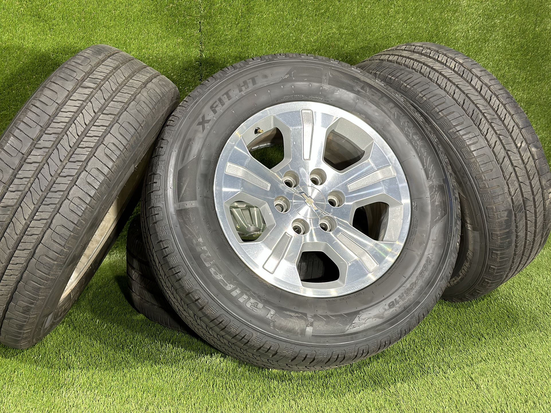 18” Chevy Silverado Wheels Silver OEM Texas Edition 6 lug rims 265/65R18 tires A/S Tahoe GMC Sierra Yukon