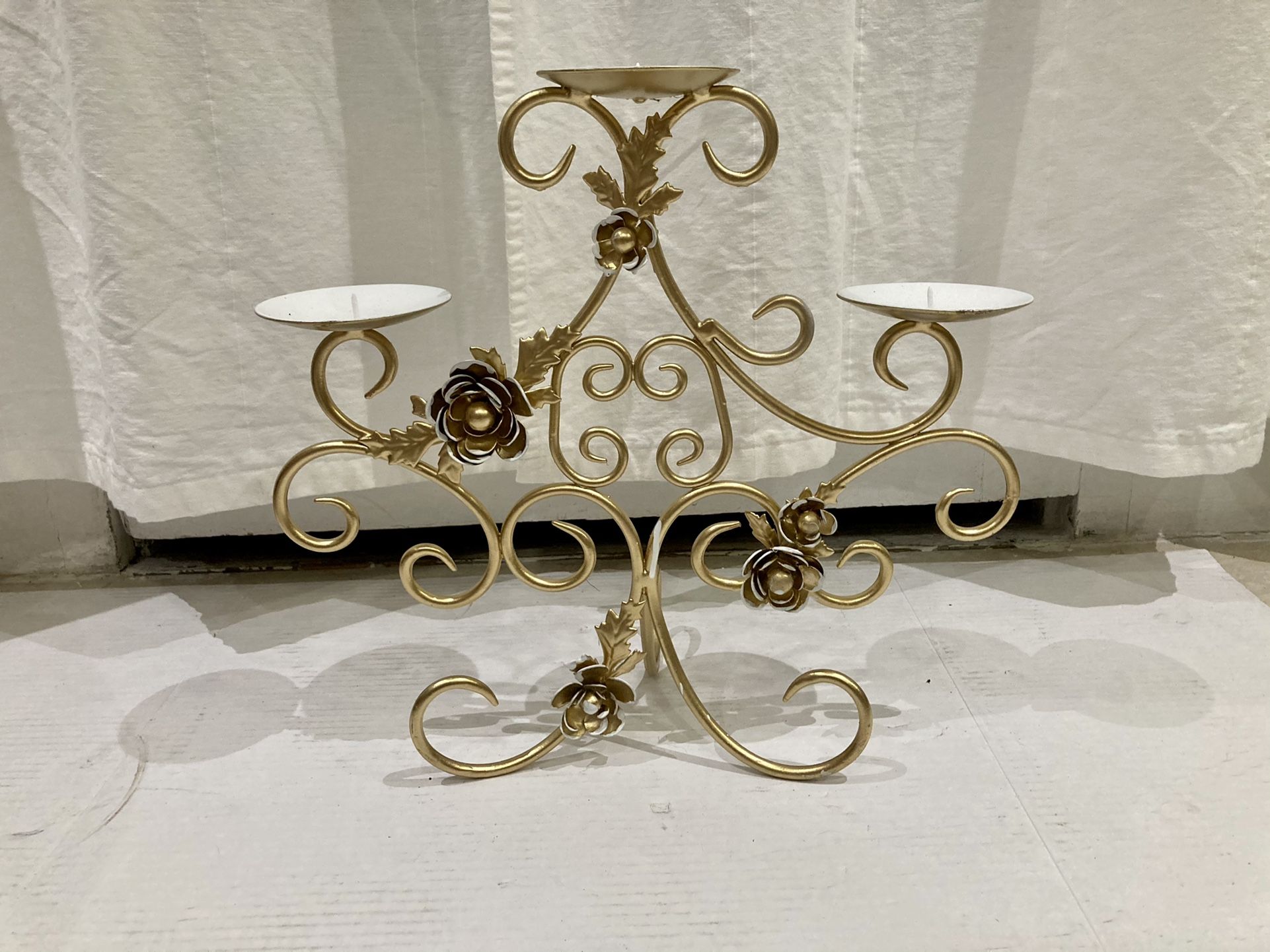 Beautiful freshly painted gold with white accent candle holder
