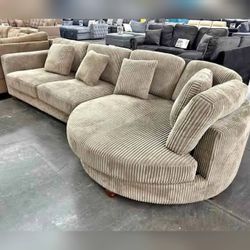 Beige corduroy sectional with Round 