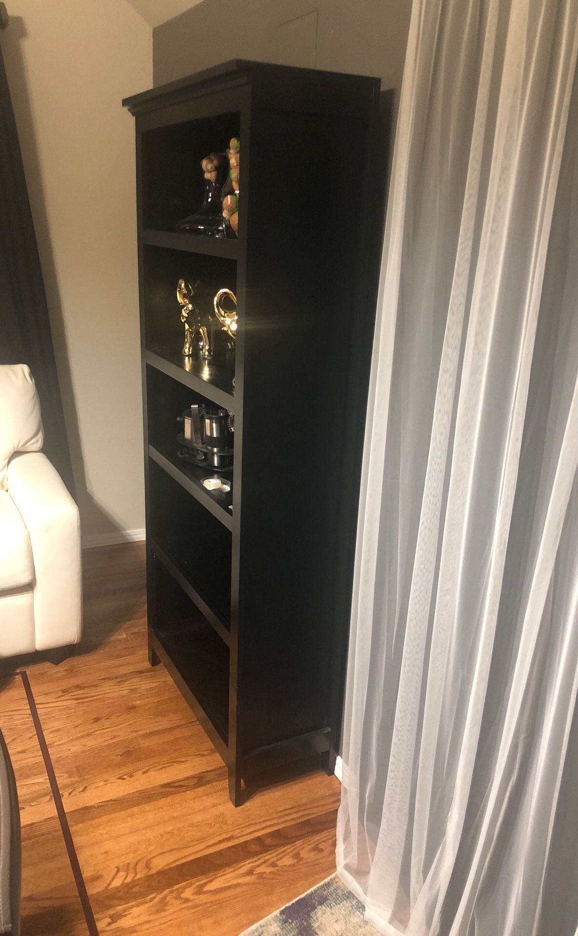 2 black book shelves