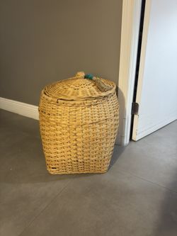 round rattan basket with a lid, from the Opalhouse designed with Jungalow collection