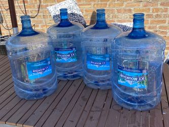 4 Five gallon BPA free water bottles with handles