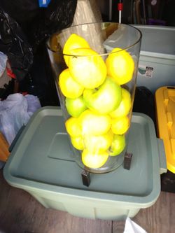 Large 12 in tall glass vase with fake lemons and apples