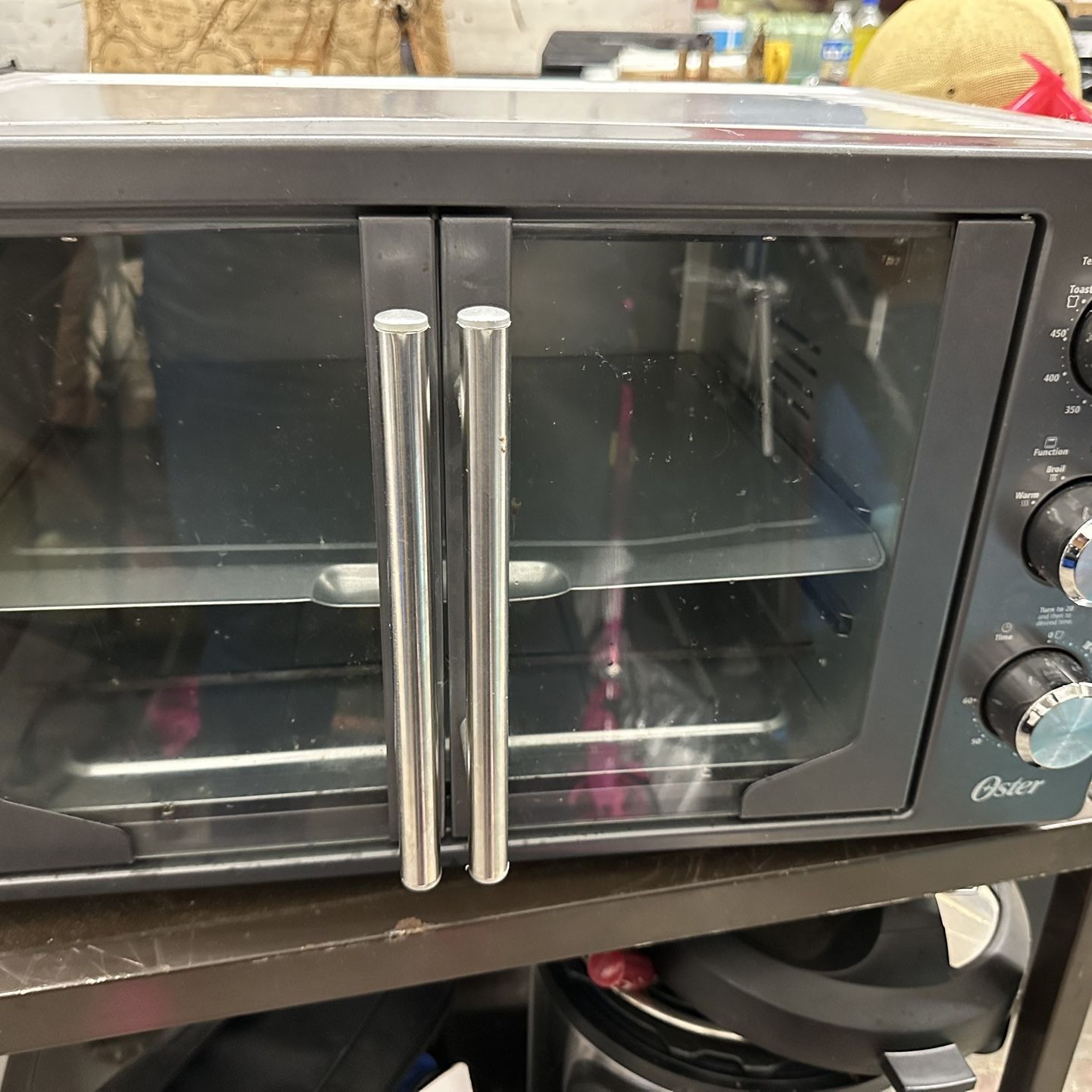 Oster Air Fryer Oven 10-in-1 Countertop Toaster Oven, XL fits 2 16” Pizzas,  Stainless Steel French Doors for Sale in Schertz, TX - OfferUp