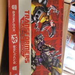 Hasbro Grimlock Vs. Bruticus Platnium Series Transformer