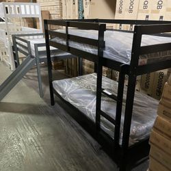Twin bunk bed. Available in espresso, white, & grey. Bunk bed only-$220. With mattresses-$399. Assembly required. Assembly not included. Tax included.