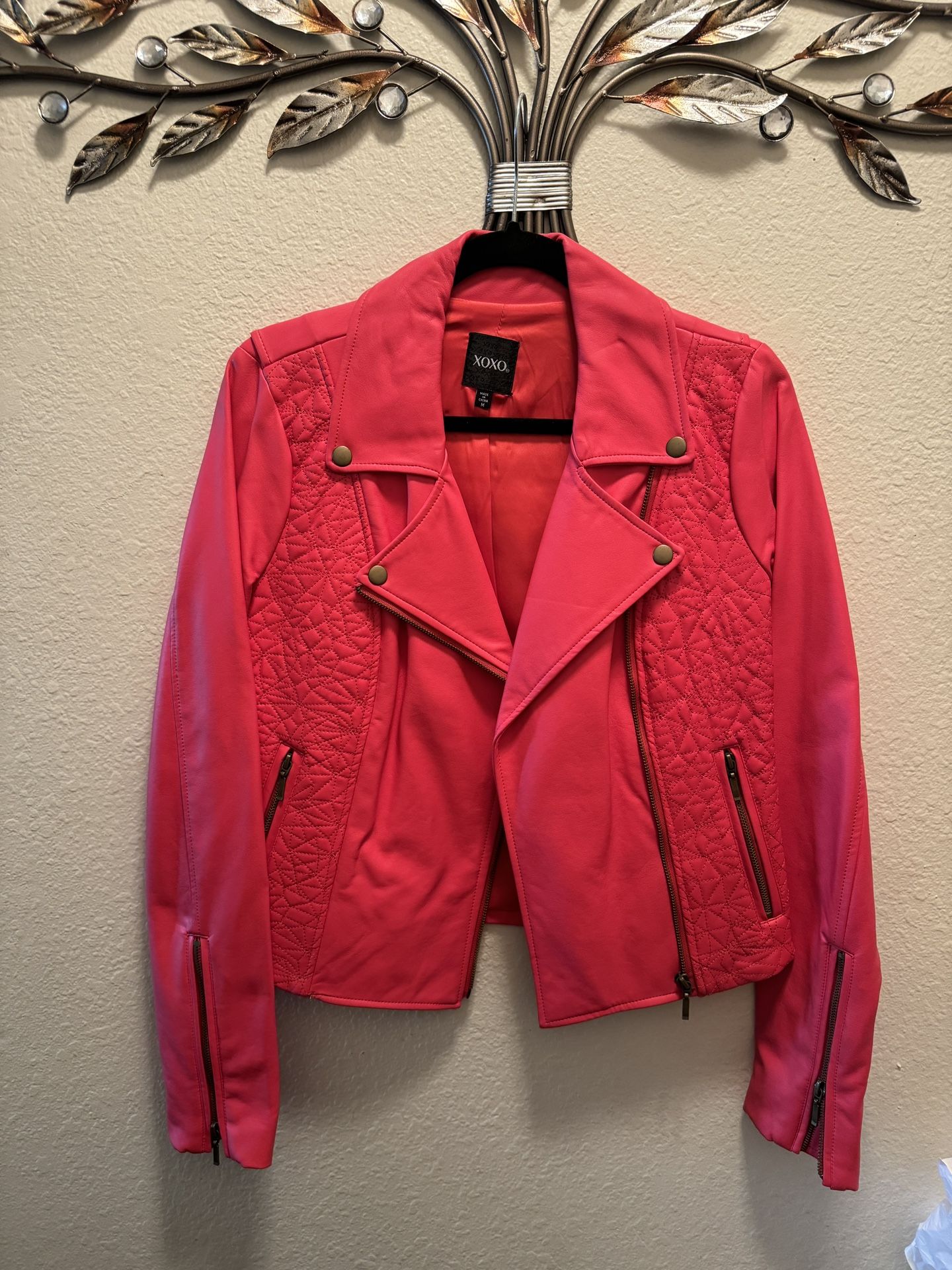 Reddish orange leather jacket