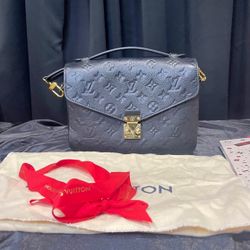 Authentic Louis Vuitton Pouchette  Métis Black  Emprereinte Monogram leather