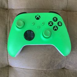 lime green white and black wireless xbox controller 